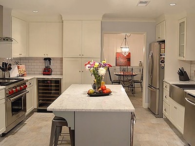 Remodeled Atlanta kitchen features CliqStudios Shaker Painted White cabinets