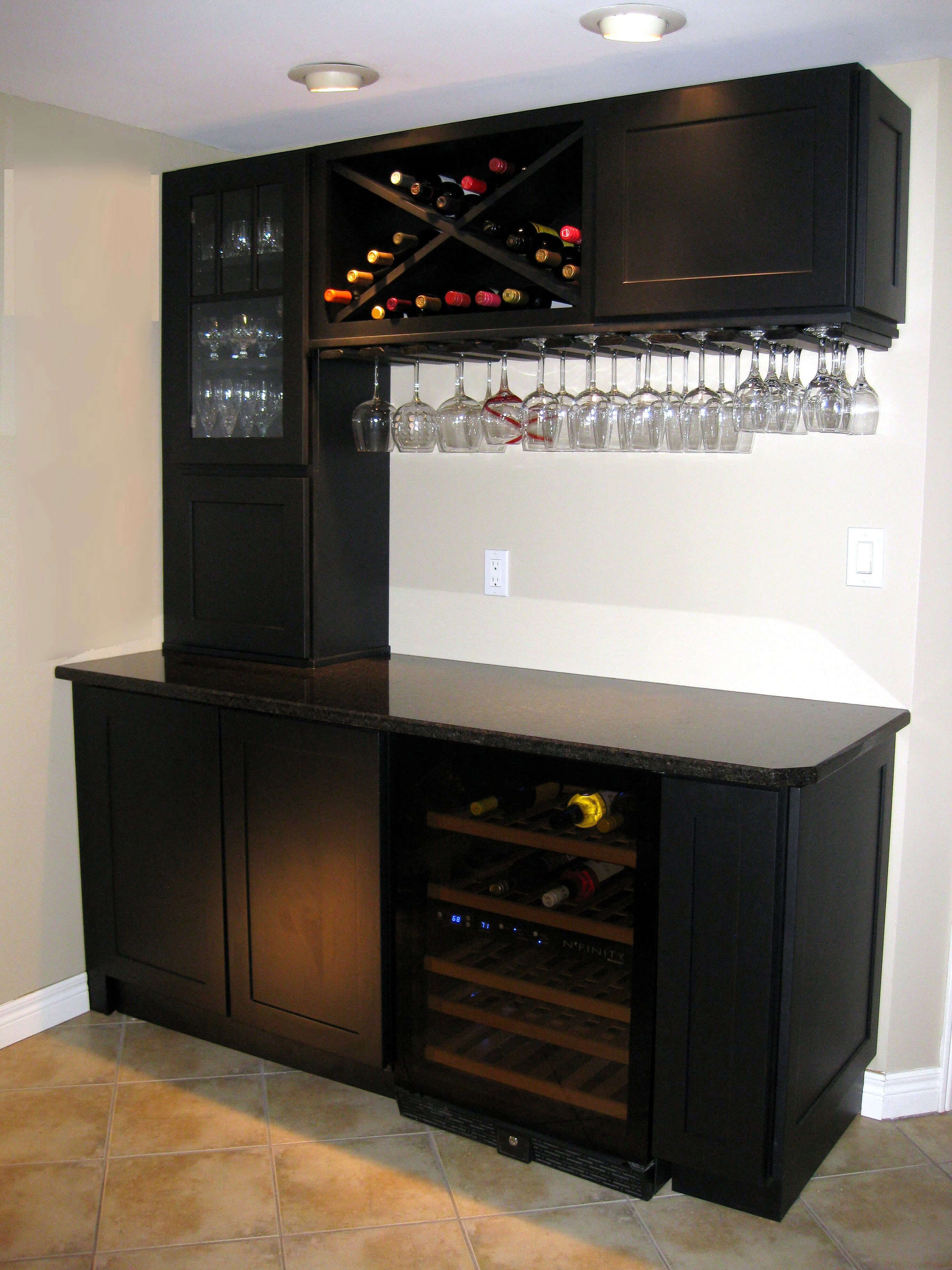 The image is of bar cabinets in the house. Bar cabinets differ from other types of cabinets in the function they serve within the home.