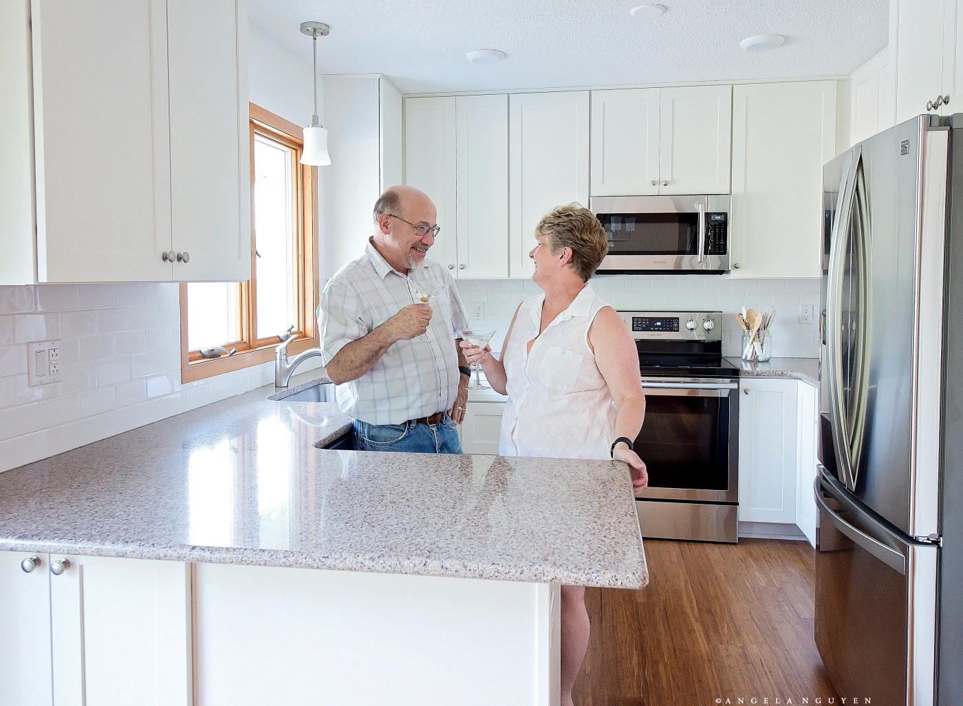 paul and sheryl in their new white kitchen