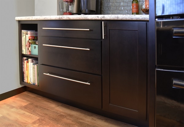 built-in beverage station has 36-inch wide drawer base, open shelves for cookbooks, glass tile backsplash and extra height over the counter for access to coffee maker