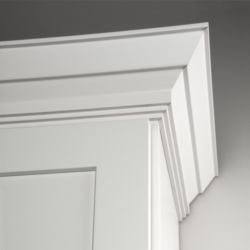 Traditional crown molding painted White at top corner of a wall cabinet