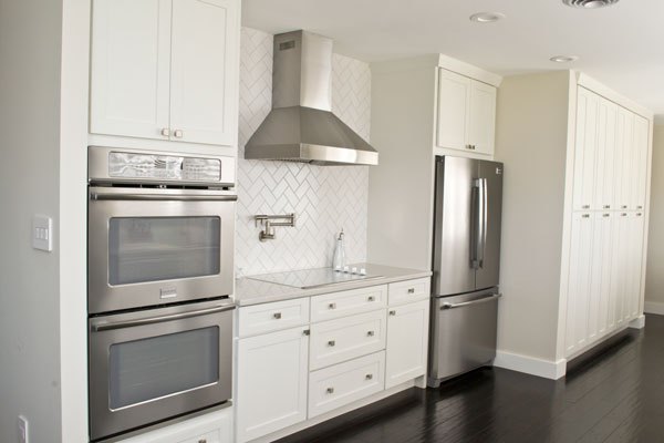 kitchen with wall of pantry cabinets